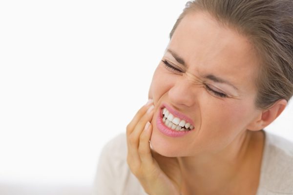 أسباب الصداع المرتبط بألم الاسنان